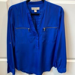 Michael Kors royal blue quarter button up blouse with gold tone zipper pockets.